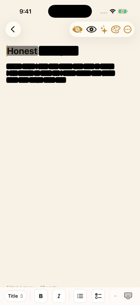 A note with every word blacked out except the one being typed.